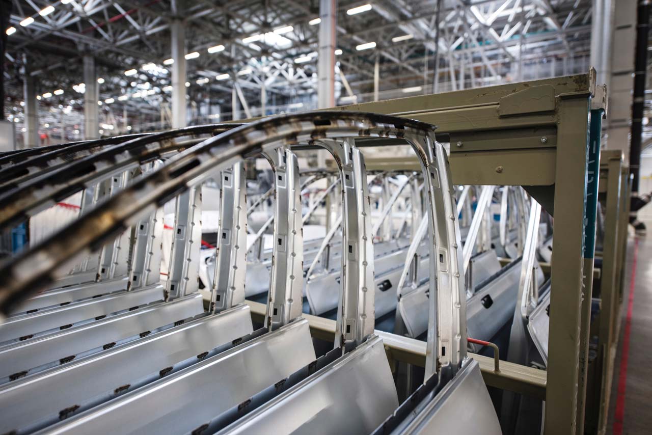 Supporting Automotive Facilities with Rigging, Hauling, and Installation Services