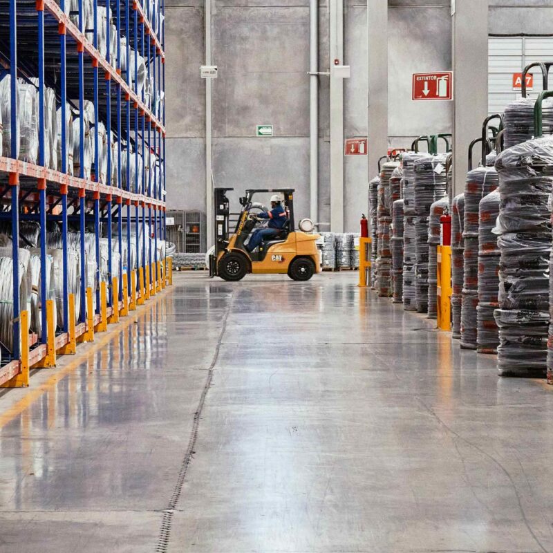 Forklift staging equipment in an industrial warehouse